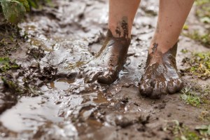 Feet in mud close-up